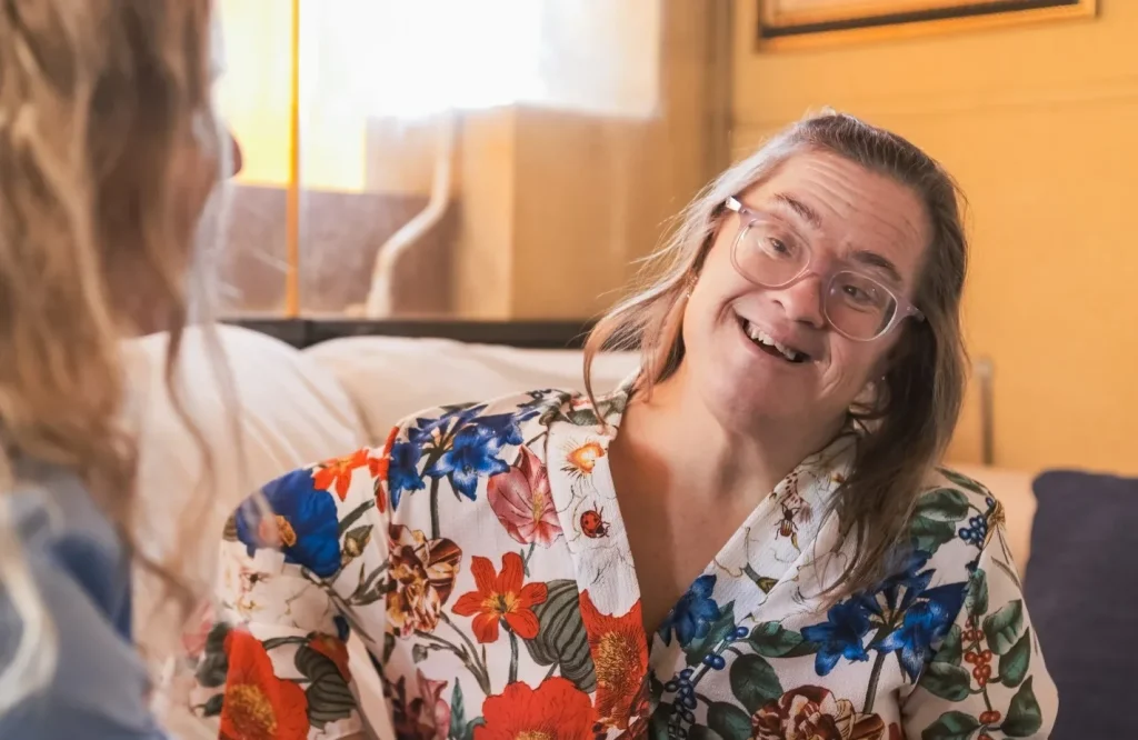 Disabled woman talking with support worker