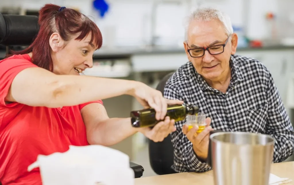 Two disabled friends in cooking class